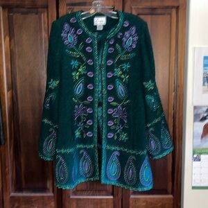 Emerald green coat size small with colorful embroidered design.